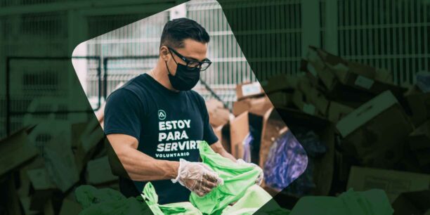 A volunteer packing donations