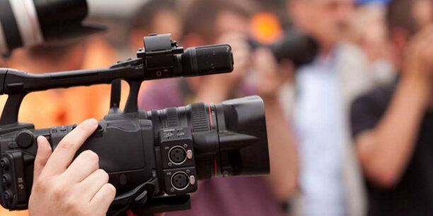 Camera at a media event
