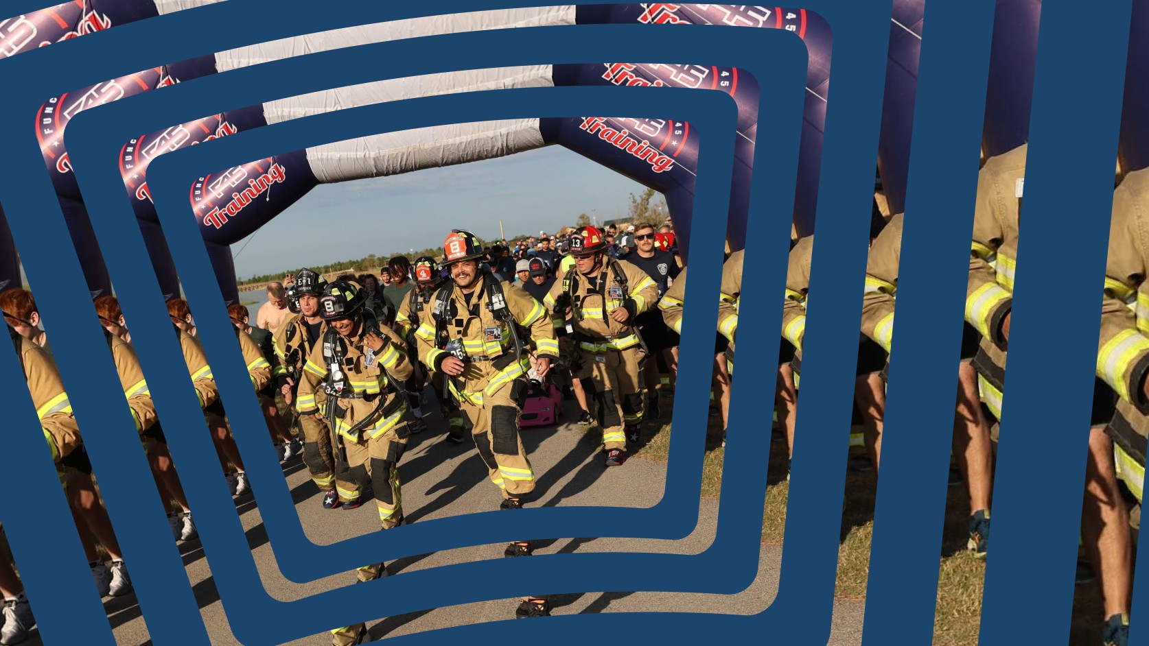 Firefighters in full turnout gear running through a race starting arch, with other participants gathered behind them